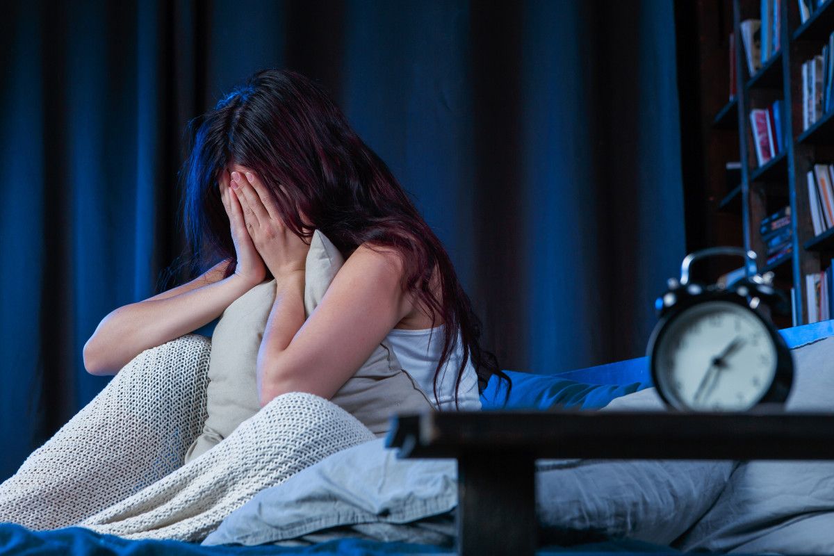 Student struggling with sleep disorder and anxiety at night - signs of stress and insomnia before exams, treatable at Sanmarg Nagpur