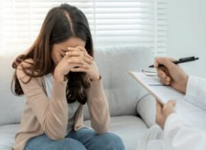 A woman receiving psychological counseling and therapy support on World Mental Health Day 2026.