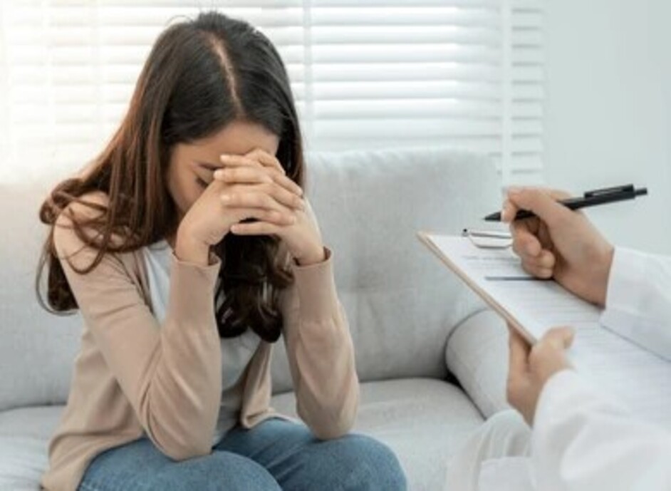 A woman receiving psychological counseling and therapy support on World Mental Health Day 2026.